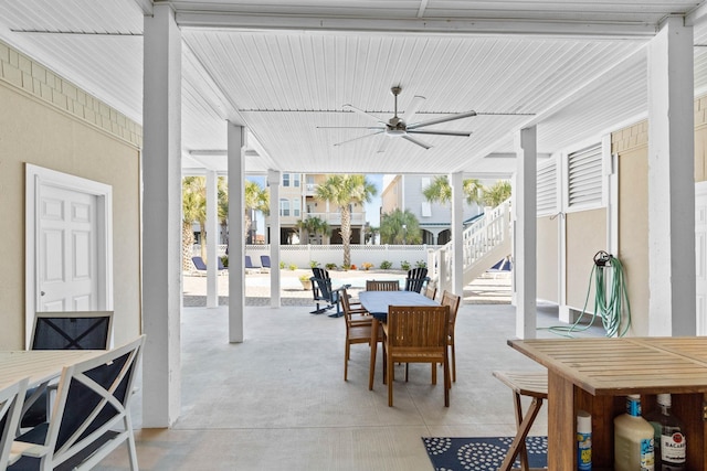 sunroom with ceiling fan and a wealth of natural light