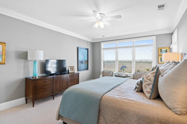 bedroom with ceiling fan, light colored carpet, and ornamental molding