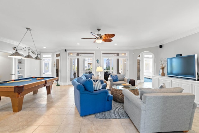 rec room featuring ceiling fan, light tile patterned flooring, french doors, ornamental molding, and billiards