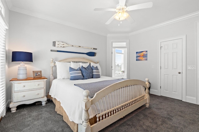 carpeted bedroom featuring ceiling fan and crown molding