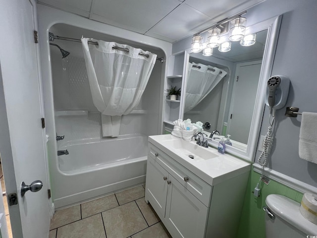 full bathroom with shower / tub combination, tile patterned floors, vanity, and toilet