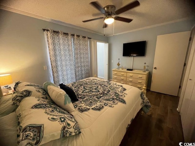107 Toby Ct Unit 103-A, North Myrtle Beach, SC 29582 - bedroom with wood finished floors, a textured ceiling, crown molding, and a ceiling fan