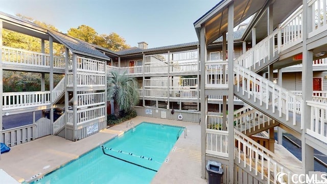 107 Toby Ct Unit 103-A, North Myrtle Beach, SC 29582 - community pool with stairway and a patio area