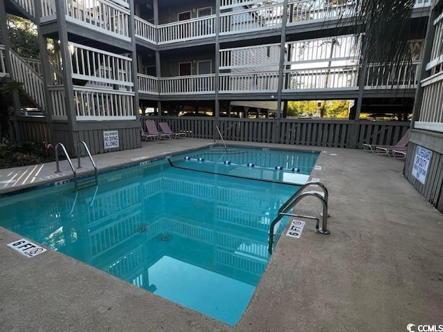 view of pool featuring sink