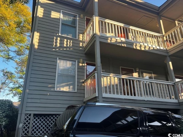 view of property exterior featuring a balcony