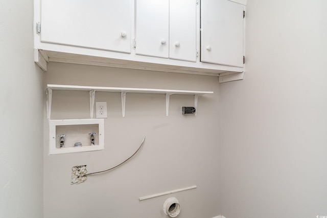 laundry area featuring cabinets, hookup for a washing machine, and electric dryer hookup