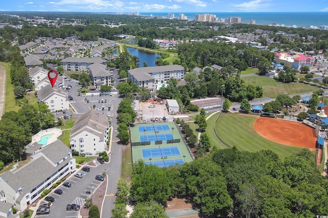 bird's eye view with a water view