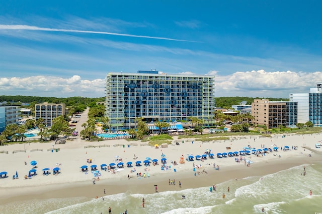 drone / aerial view with a view of the beach and a water view