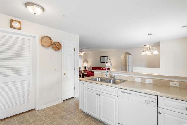 kitchen with pendant lighting, sink, white cabinetry, dishwasher, and ceiling fan with notable chandelier