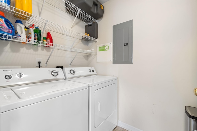 laundry area featuring washer and clothes dryer and electric panel