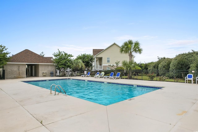 view of pool featuring a patio