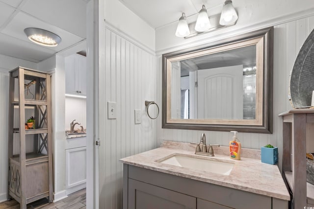 bathroom featuring wood finished floors and vanity