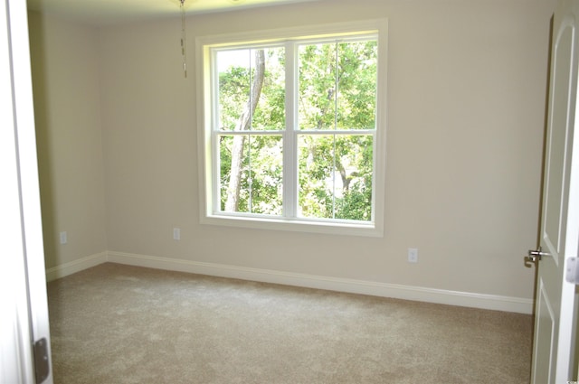 35 Delray Dr Unit 2-C, Murrells Inlet, SC 29576 - unfurnished room featuring light colored carpet, healthy amount of natural light, and baseboards