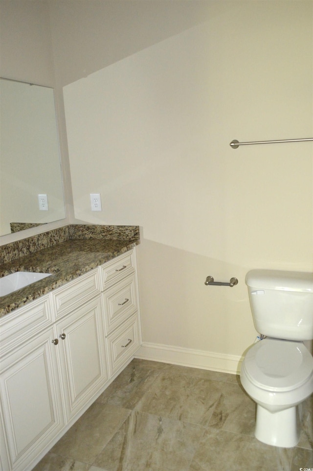 35 Delray Dr Unit 2-C, Murrells Inlet, SC 29576 - bathroom featuring vanity, baseboards, and toilet