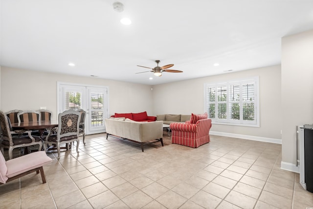 tiled bedroom with ceiling fan and wine cooler