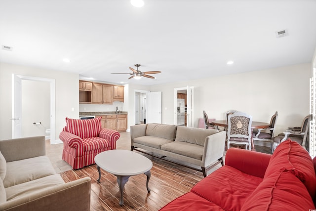 living room with ceiling fan