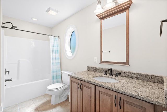 full bathroom featuring tile patterned floors, vanity, shower / bath combination with curtain, and toilet