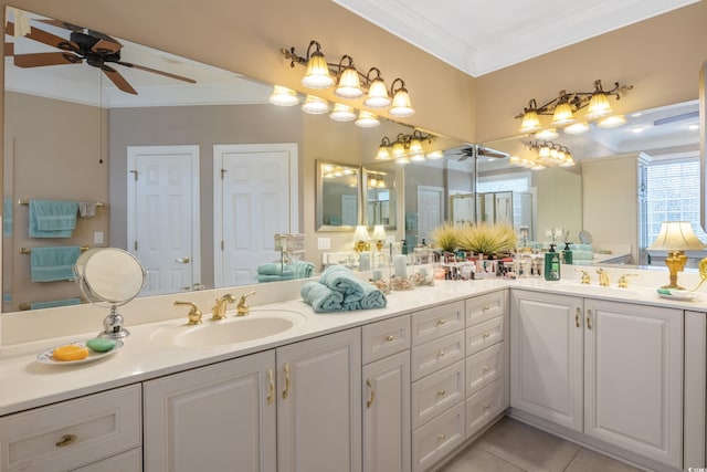 bathroom with tile floors, ornamental molding, ceiling fan, and oversized vanity