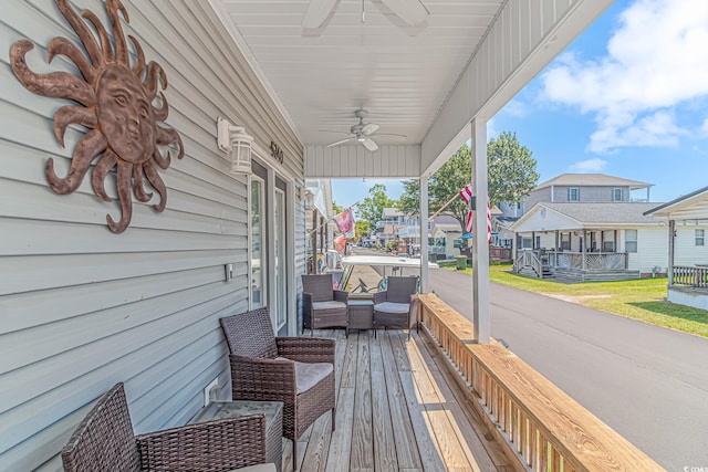 6001-5240 S Kings Hwy, Myrtle Beach, SC 29575 - wooden deck with a porch, ceiling fan, and a residential view