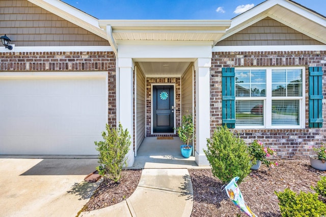 property entrance with a garage