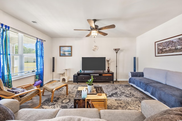 living room with ceiling fan