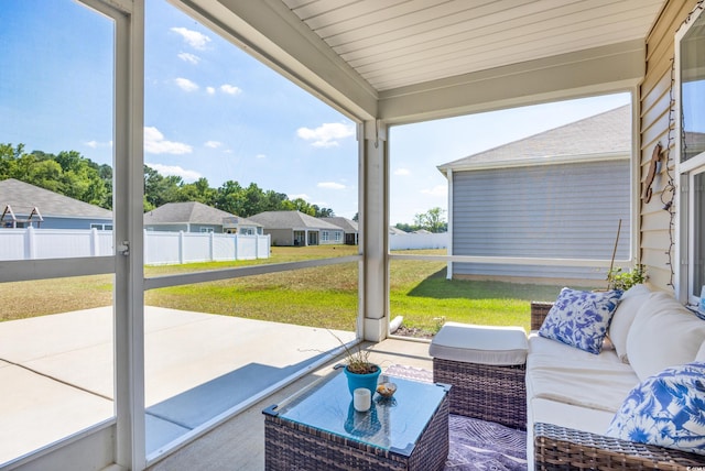 sunroom with plenty of natural light