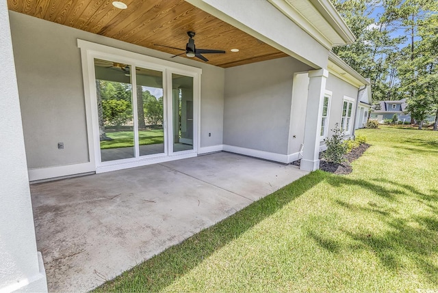 view of patio featuring ceiling fan