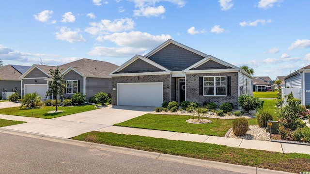 craftsman house with a garage and a front yard