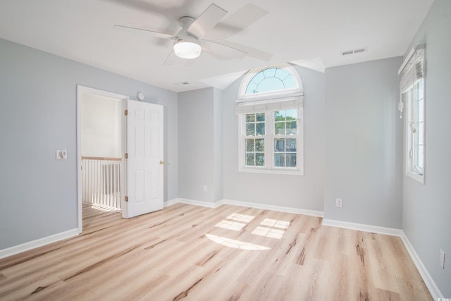 unfurnished bedroom featuring ceiling fan and light wood-type flooring