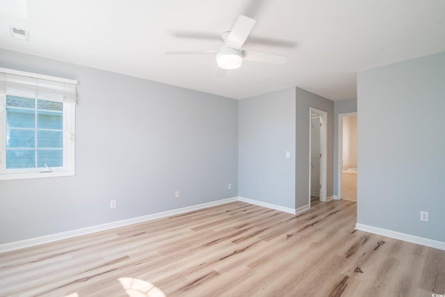 unfurnished room featuring light hardwood / wood-style floors and ceiling fan