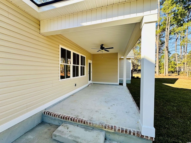 view of patio featuring ceiling fan