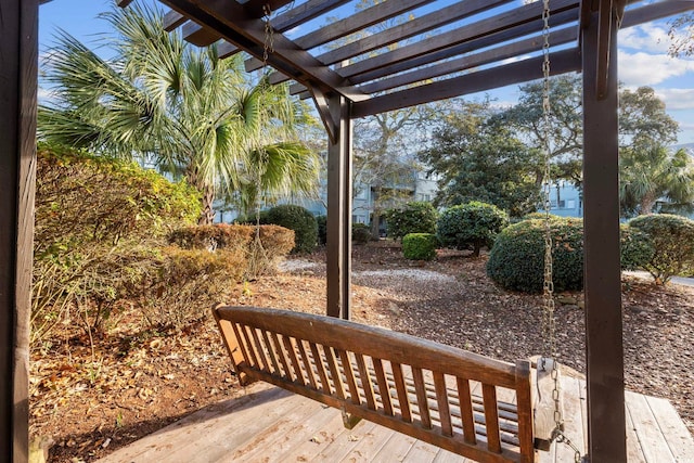 wooden terrace with a pergola