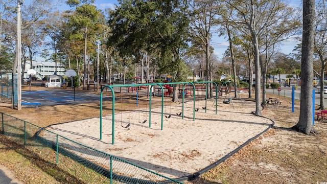 community play area featuring fence