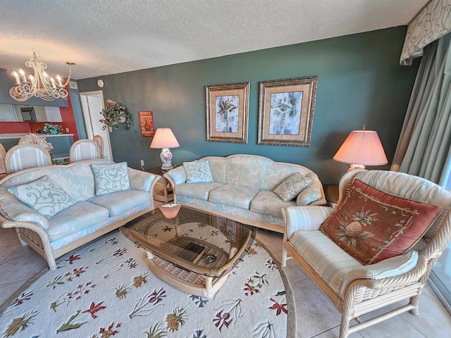 living room with tile floors, an inviting chandelier, and a textured ceiling