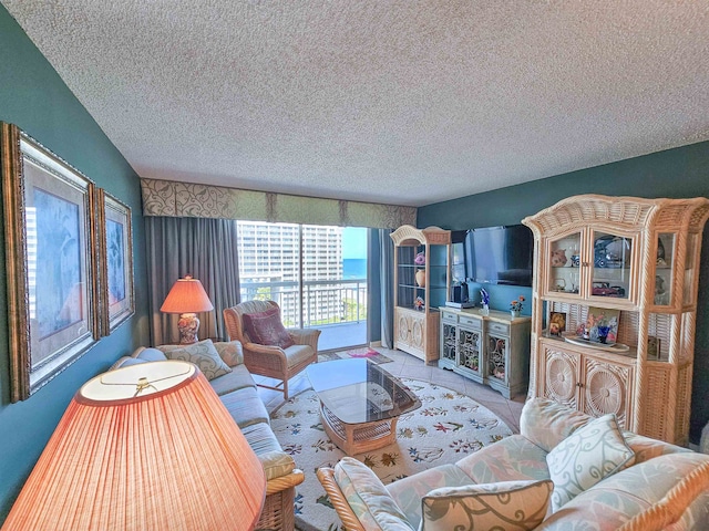 living room with tile floors and a textured ceiling