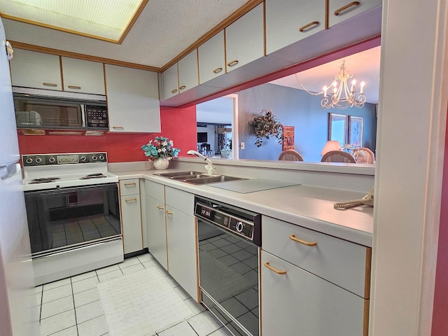 kitchen with light countertops, light tile patterned floors, an inviting chandelier, black appliances, and a sink