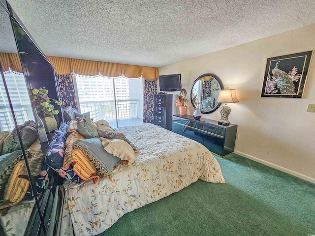 carpeted bedroom featuring a textured ceiling