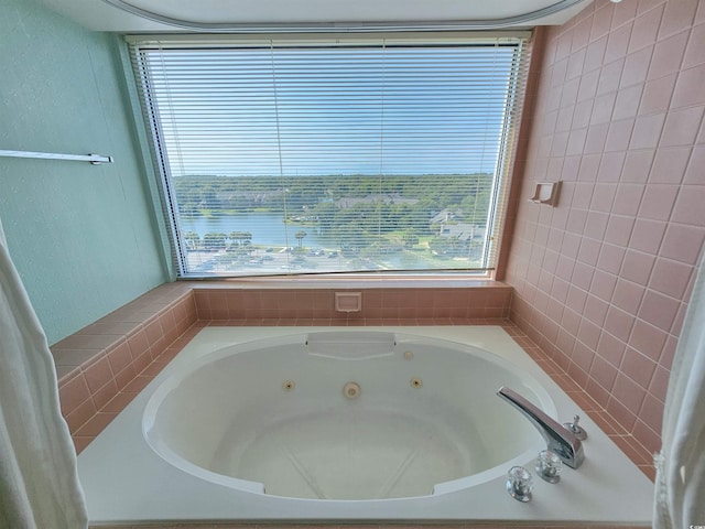 bathroom with tiled bath