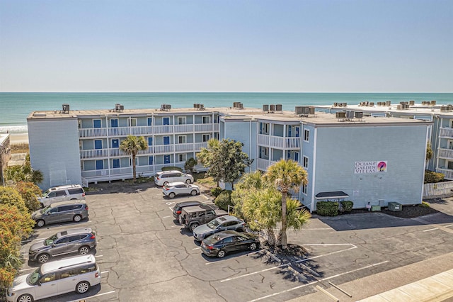 view of building exterior with a water view