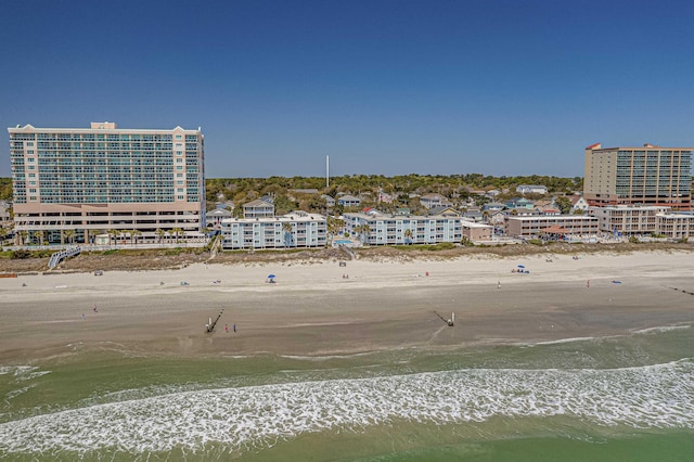 bird's eye view with a view of the beach and a water view