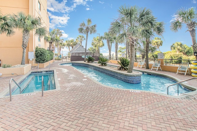 view of swimming pool with a gazebo