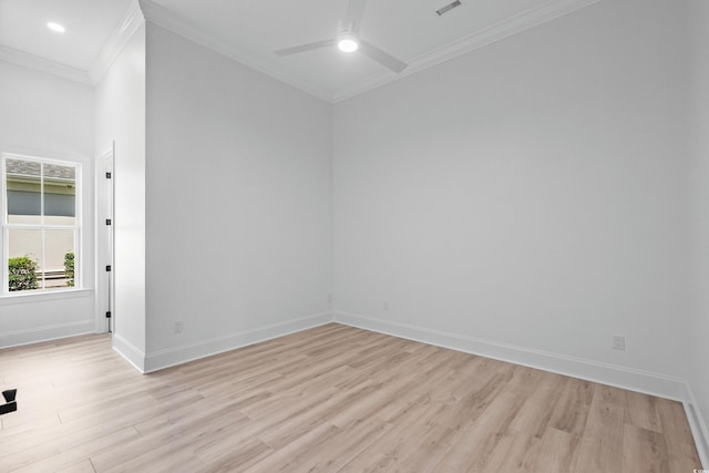 unfurnished room featuring ceiling fan, ornamental molding, and light hardwood / wood-style flooring