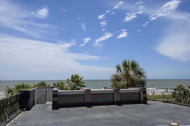 view of patio featuring a water view