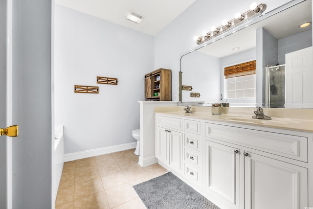 full bathroom with tile patterned flooring, shower with separate bathtub, vanity, and toilet