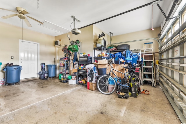 garage featuring a garage door opener and ceiling fan