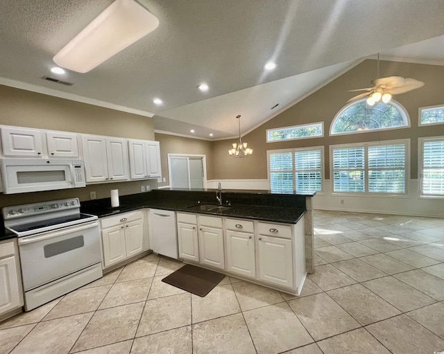 kitchen with white cabinetry, sink, white appliances, and decorative light fixtures