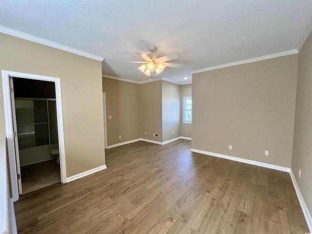 unfurnished room featuring ceiling fan, ornamental molding, a textured ceiling, and light wood-type flooring