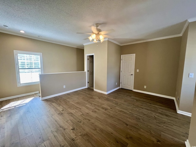 unfurnished room with dark hardwood / wood-style flooring, ceiling fan, ornamental molding, and a textured ceiling