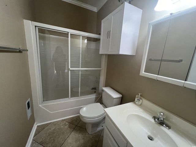 full bathroom featuring toilet, crown molding, shower / bath combination with glass door, vanity, and tile patterned flooring