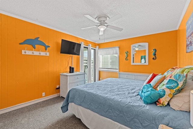 bedroom with ceiling fan, carpet floors, a textured ceiling, and ornamental molding